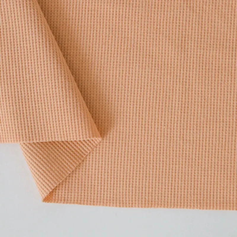 Tissu coton gaufré uni au mètre