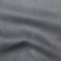 Gros plan sur le Tissu en lyocell denim multicolore de Longan Craft France, un tissu lyocell sergé respirant et confortable à l'armure diagonale subtile, idéal pour la confection de jeans.