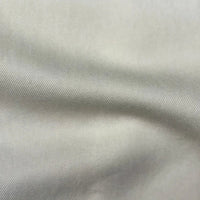Découvrez de près le tissu en lyocell denim multicolore au mètre de Longan Craft France : un denim sergé respirant, confortable et durable, idéal pour jeans.