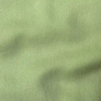 Gros plan sur un tissu denim lyocell multicolore de Longan Craft France, présentant une texture nervurée en diagonale. Ce textile aéré et confortable est idéal pour la fabrication de jeans.