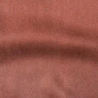 Gros plan sur le denim Tissu en lyocell multicolore de Longan Craft France, mettant en valeur son tissage sergé texturé et son froissage subtil - un tissu lyocell respirant et confortable, parfait pour les jeans.