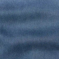 Gros plan sur le tissu en lyocell denim multicolore au mètre de Longan Craft France, qui présente un tissage sergé diagonal avec des lignes régulièrement espacées et une texture douce, durable et respirante, idéale pour des jeans confortables.