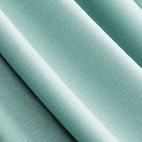 Gros plan sur le Jersey modal uni au mètre de Longan Craft France, un tissu léger sarcelle en jersey coton-modal avec une texture lisse et respirante et des plis doux - idéal pour les vêtements de nuit.