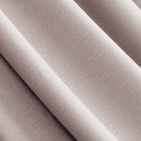 Gros plan sur le Jersey modal uni au mètre de Longan Craft France : tissu jersey coton-modal beige doux avec tissage visible, finition lisse et mate, et plis doux - un textile idéal et respirant pour les vêtements de nuit et le confort.