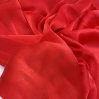 Découvrez de près le tissu organza uni au mètre Longan Craft France : léger, transparent et soyeux, idéal pour vêtements ou décoration grâce à ses plis doux et son éclat subtil.