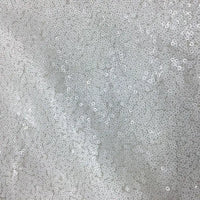 Tissu pailleté uni au mètre