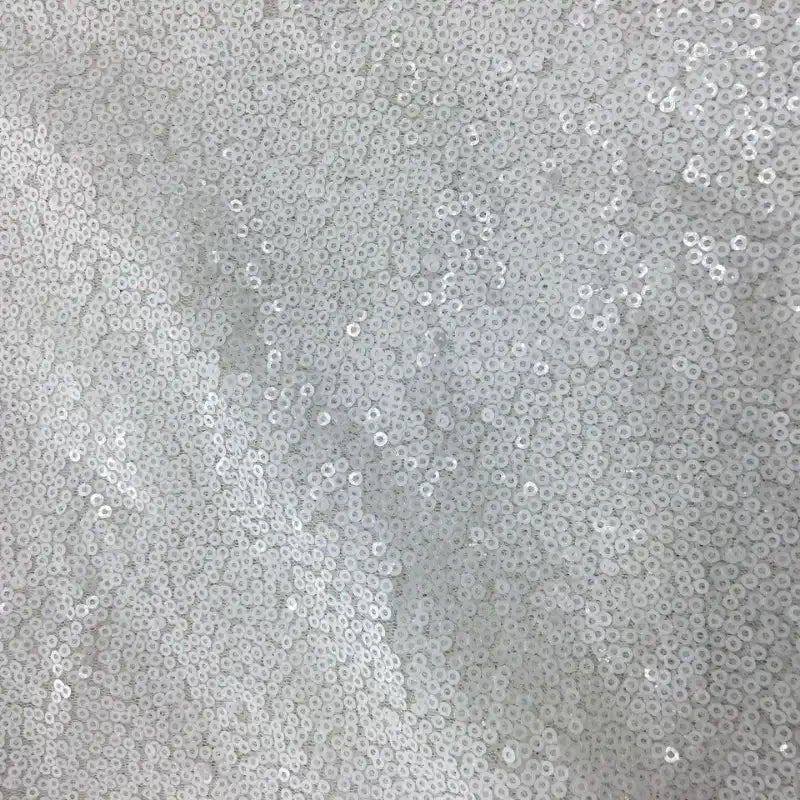 Tissu pailleté uni au mètre