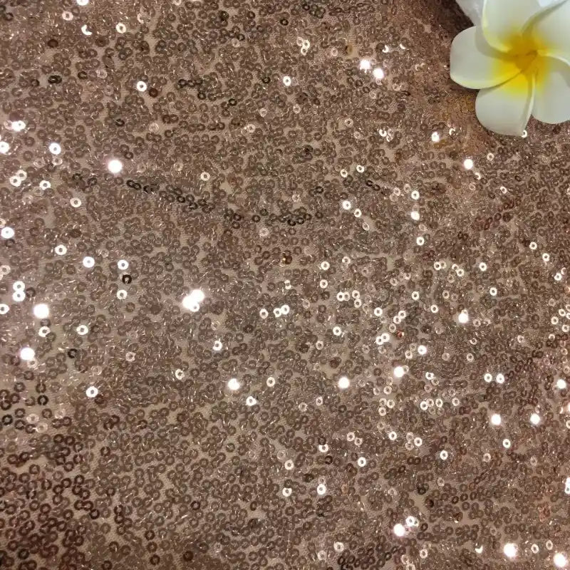 Tissu pailleté uni au mètre