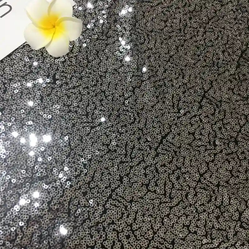 Tissu pailleté uni au mètre