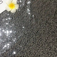 Tissu pailleté uni au mètre