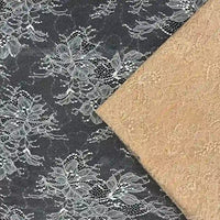 Deux Tissu dentelle pailleté avec sequins au mètre de Longan Craft France - l'un noir avec des fleurs blanches, l'autre beige avec un motif subtil - offrent une dentelle de qualité élégante pour les peignoirs et la lingerie.
