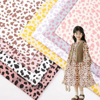 Tissu en coton imprimé motif vache au mètre