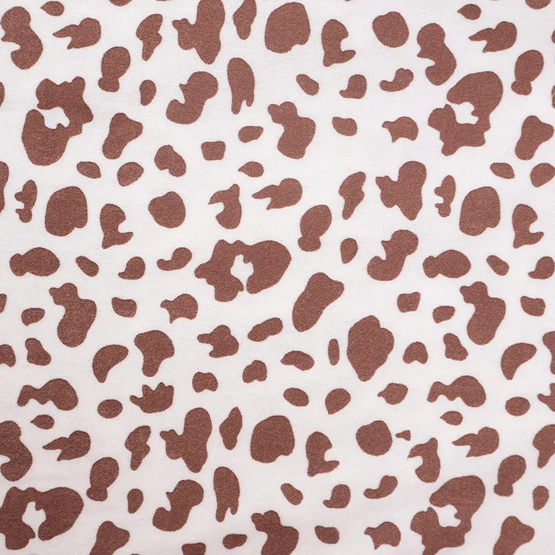 Tissu en coton imprimé motif vache au mètre