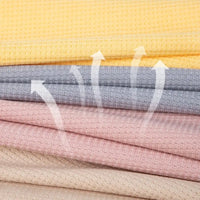Tissu gaufré stretch uni au mètre