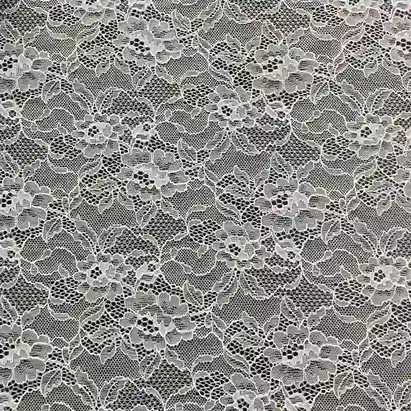 Découvrez le Tissu dentelle extensible au mètre de Longan Craft France : une dentelle extensible multicolore de haute qualité avec des motifs floraux et de feuilles complexes, parfaite pour les vêtements, la lingerie ou les jupes.