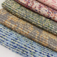 Tissu tweed bouclé rayé au mètre