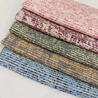 Tissu tweed bouclé rayé au mètre