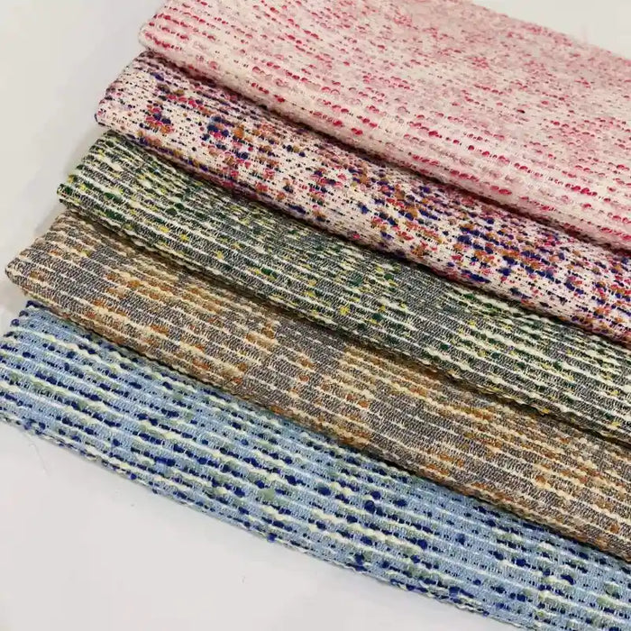 Tissu tweed bouclé rayé au mètre