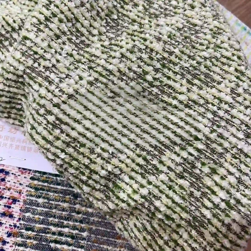 Tissu tweed bouclé rayé au mètre