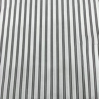 Le Linon de coton à fines rayures au mètre de Longan Craft France est un tissu en coton imprimé multicolore, idéal pour la confection de robes et vêtements d'été.