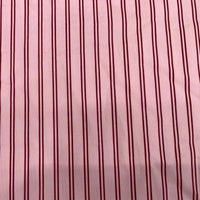 Découvrez de près le Linon de coton à fines rayures au mètre de Longan Craft France, un tissu en coton imprimé multicolore parfait pour la confection de robes et vêtements d'été.