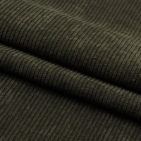 Gros plan sur le Tissu velours côtelé épais 8 côtes au mètre de Longan Craft France, montrant sa texture douce et ses crêtes parallèles - un mélange de polyester parfait pour l'ameublement et la décoration intérieure.