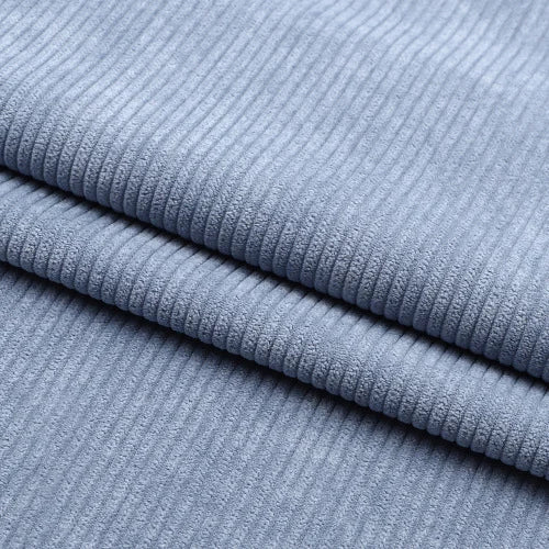 Gros plan sur le tissu velours côtelé épais 8 côtes au mètre de Longan Craft France, montrant sa texture douce et nervurée, idéale pour l'ameublement et la décoration intérieure.
