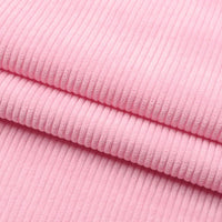 Gros plan sur le tissu velours côtelé épais 8 côtes au mètre de Longan Craft France, qui présente ses stries verticales et sa texture douce - parfait pour l'ameublement et la décoration intérieure.