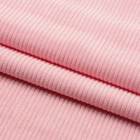 Un gros plan du Tissu velours côtelé épais 8 côtes au mètre de Longan Craft France montre sa texture douce et nervurée, idéale pour l'ameublement et la décoration intérieure.