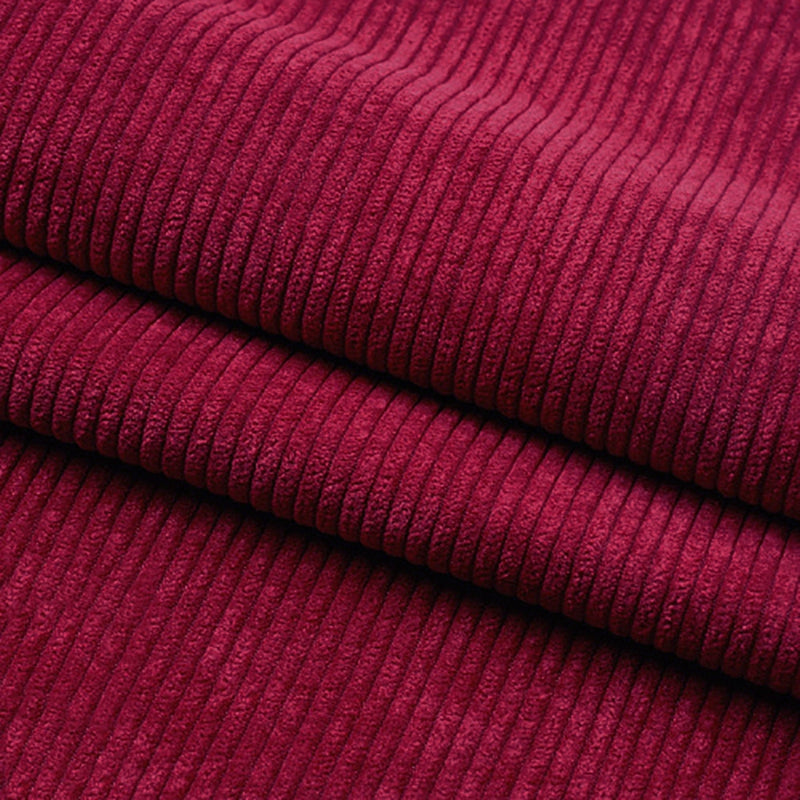 Gros plan sur le tissu velours côtelé épais 8 côtes au mètre de Longan Craft France, mettant en valeur sa texture douce et ses stries verticales - parfait pour l'ameublement et la décoration intérieure.