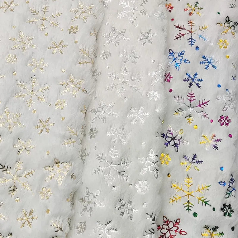 Tissus velours blanc à motif flocons de neige au mètre