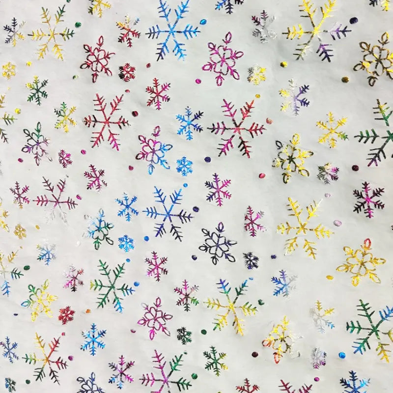 Tissus velours blanc à motif flocons de neige au mètre