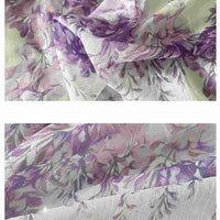 Découvrez le Tissu mousseline imprimé fleurs de glycine violettes au mètre de Longan Craft France, une mousseline légère et douce à motif floral idéal pour robes couture. Sa transparence et son drapé mettent en valeur l'élégance aérienne du tissu.