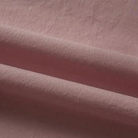 Gros plan sur le Tissu linon de coton tissé au mètre de Longan Craft France, un coton multicolore à la texture douce, aux plis délicats et à la finition lisse et légèrement mate. Idéal comme doublure coton haute douceur.