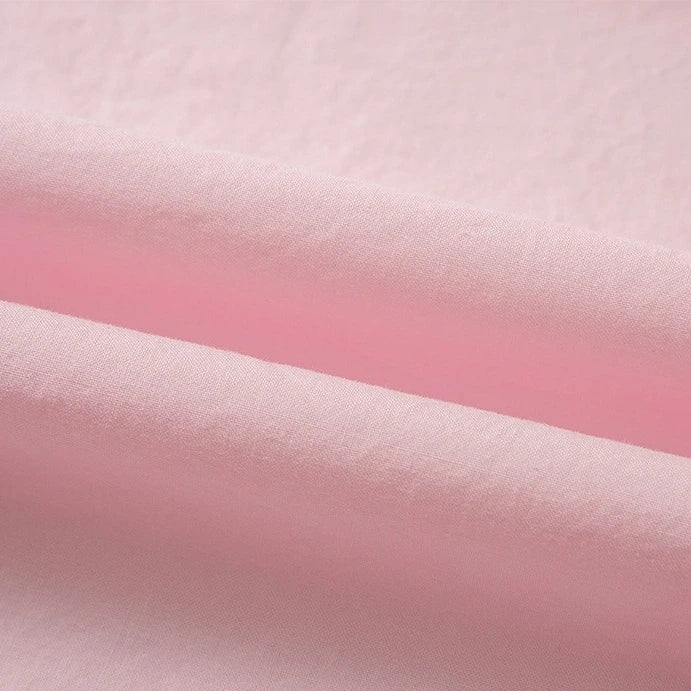 Une vue rapprochée du Tissu linon de coton tissé au mètre de Longan Craft France, qui présente un coton linon multicolore avec une texture douce et lisse - idéal comme doublure coton haute douceur pour les projets de tissus.
