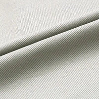 Gros plan sur Longan Craft France Tissu jean coloré 7,5 oz au mètre-100% coton denim sergé multicolore, montrant son tissage sergé beige et son épaisseur, idéal pour les vêtements ou la décoration recherchant un tissu jean haute qualité.