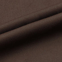 Gros plan sur le Tissu jean coloré 7,5 oz au mètre de Longan Craft France : denim sergé multicolore 100% coton avec un motif côtelé diagonal et un bord plié - parfait pour les jeans, les vêtements et la décoration.