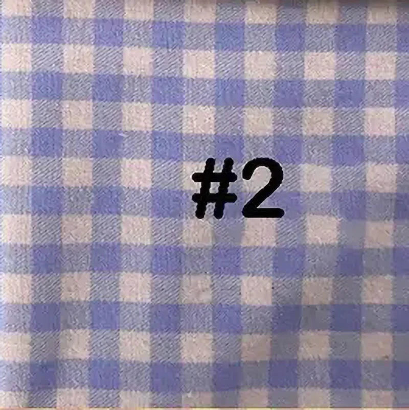 Une Flanelle de coton à carreaux colorés bleu et blanc de Longon Craft France, 100% coton, parfaite pour les manteaux d'automne, les chemises, la couture et l'ameublement, avec "#2" en noir sur la surface.