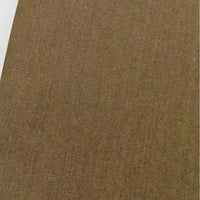 Un gros plan du Tissu jean tissé coloré au mètre de Longan Craft France montre son tissage sergé fin et diagonal dans un denim de coton de 6,5 oz - parfait pour une décoration intérieure élégante ou la confection de jeans.