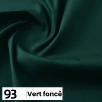 Un morceau de popeline de coton vert foncé de Longan Craft France, présenté avec de légers plis. En bas à gauche : boîte blanche avec "93" et "Vert foncé". Parfait pour les chemises, les robes, les doublures et autres projets de couture.
