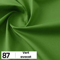 Gros plan sur la popeline de coton au mètre verte et lisse de Longan Craft France, torsadée en spirale. En bas à gauche, une case blanche indique le numéro 87 et "Vert avocat". Idéal pour les chemises, les robes, les doublures.