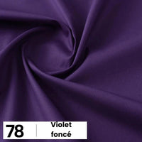 Gros plan sur la popeline de coton au mètre de Longan Craft France, d'un violet foncé avec une douce torsion. Un encadré blanc dans le coin indique "78" et "Violet foncé". Ce tissu léger et uni est parfait pour les chemises, les robes, les doublures et la confection.
