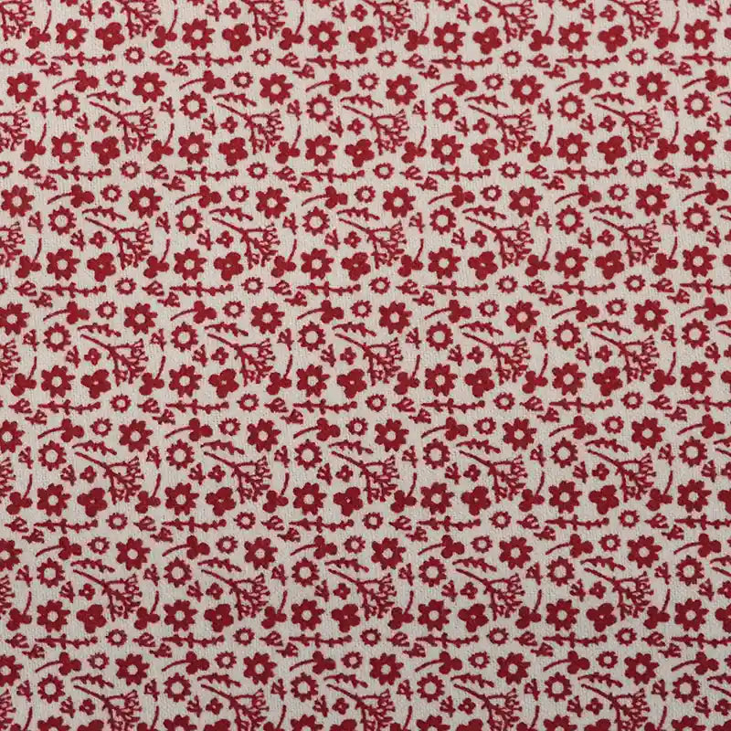 Flanelle de coton fleurie au mètre de Longan Craft France : tissu flanelle imprimé coloré d'automne avec motif floral et feuilles sur fond blanc, idéal pour robes, vêtements et loisirs créatifs.