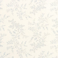 Flanelle de coton fleurie au mètre de Longan Craft France : motif subtil à petites branches, feuilles et baies gris pâle sur fond beige, idéal pour couture de robes, vêtements ou loisirs créatifs.