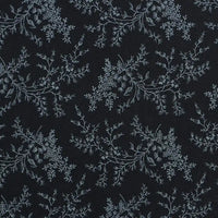 Flanelle de coton fleurie au mètre de Longan Craft France : tissu flanelle imprimé d'un motif botanique bleu clair sur fond noir, idéal pour robes et vêtements d'hiver élégants ou projets créatifs.