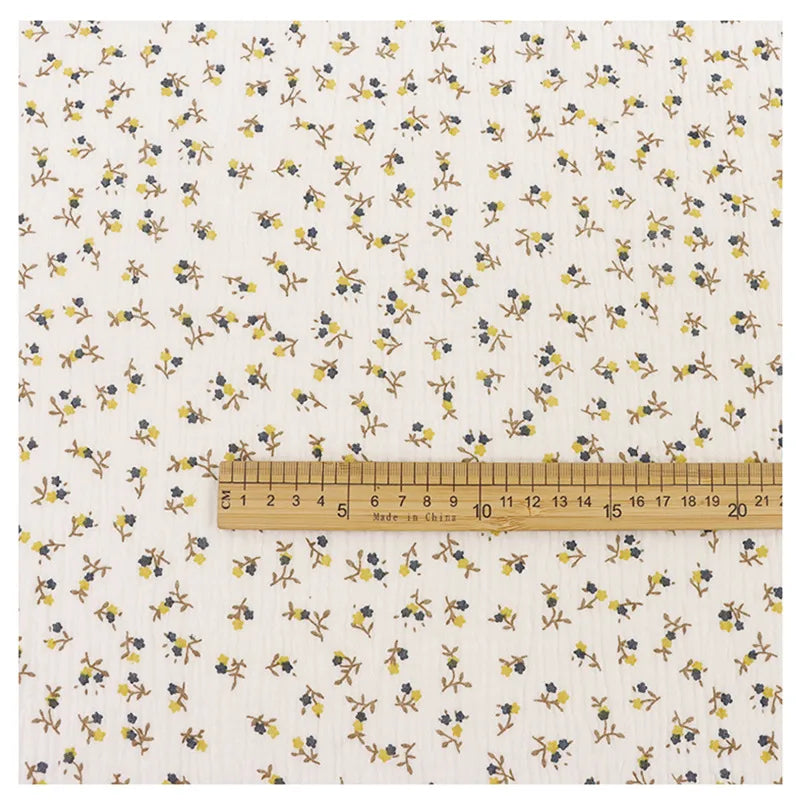 Tissu double gaze de coton à motif floral au mètre