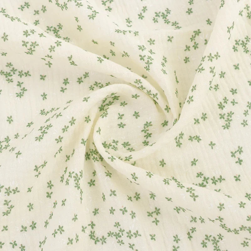 Tissu double gaze de coton à motif floral au mètre