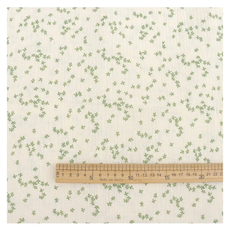 Tissu double gaze de coton à motif floral au mètre