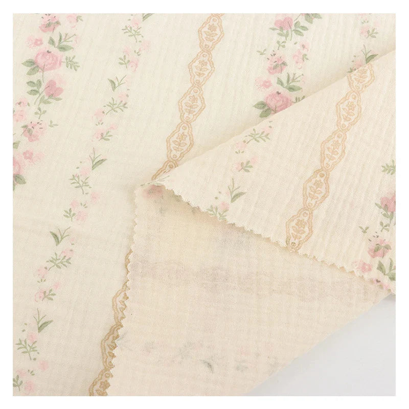 Tissu double gaze de coton à motif floral au mètre