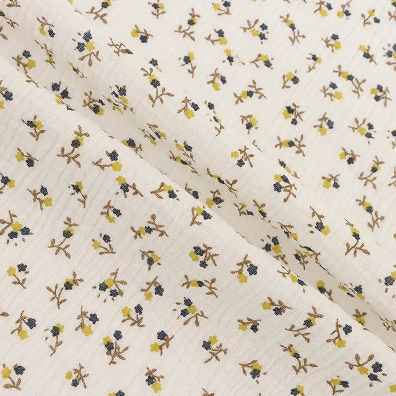 Tissu double gaze de coton à motif floral au mètre